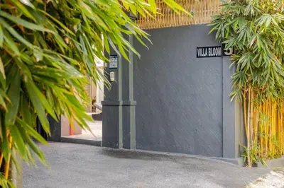 a street sign on the side of a building at 6BR Luxe Pool Villa Seminyak Group Escape in Seminyak