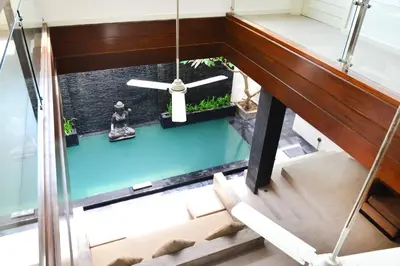 an overhead view of a house with a glass floor at Villa Tentrem Legian in Legian