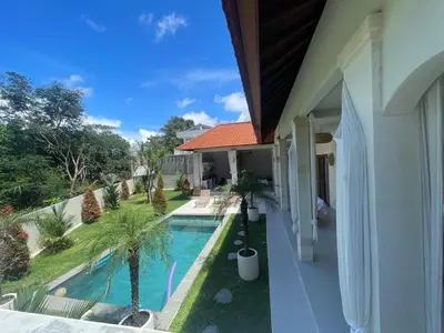 a view of a house with a swimming pool at Villa Makna Canggu in Canggu