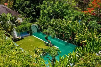 an aerial view of a garden with a swimming pool at Yelena Spacious 3 BR Private Pool Villa in Canggu