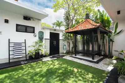 a gazebo in the yard of a house at Homy 3 Bedrooms Villas in Canggu Umalas in Kerobokan
