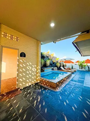 a house with a swimming pool in a yard at Dbelid Royal House - Private 5BR Villa in Jimbaran in Jimbaran