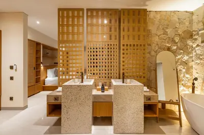 a bathroom with two sinks and a tub at Villa Twin 1 by BaliSuperHost in Seminyak