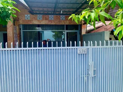 a white fence in front of a house at Digital Nomad Oasis in Bali Calm, Cozy, Connected in Kerobokan