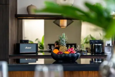 a bowl of fruit sitting on top of a counter at Villa Knack, Seminyak in Kerobokan
