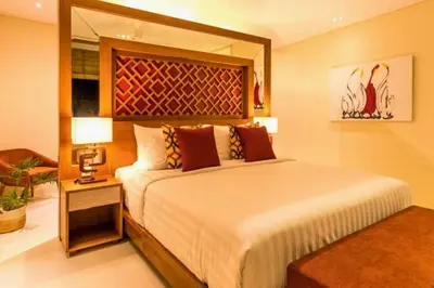 a bedroom with a large bed in a room at Kalyca Stunning 5 BR Private Pool Villa in Jimbaran