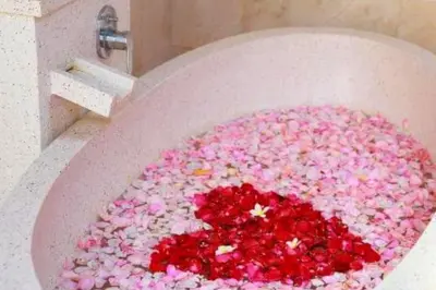 a bath tub filled with pink and red sprinkles at Deanda Elegant 4 BR Private Pool Villa in Jimbaran