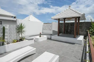 a gazebo on a patio of a house at The Wina Villa Canggu by The Wina Resorts in Canggu