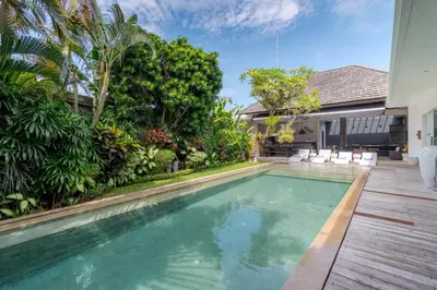 a swimming pool in the backyard of a house at Gorgeous Tropical 3 Bed Pool Villa, 24hr Security in Seminyak