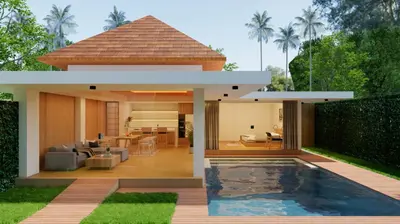 a house with a swimming pool in the backyard at Bvilla Spa in Seminyak