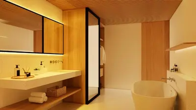 a bathroom with a tub and a sink and a mirror at Bvilla Spa in Seminyak