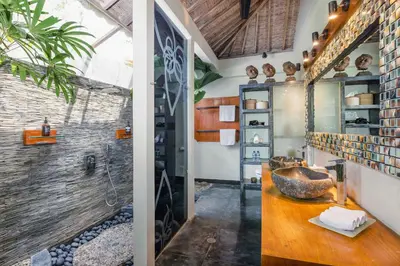 a bathroom with a shower and a sink at Villa Cinta Damai - Stunning & Stylish 4BR Luxury Villa in the Heart of Seminyak, Just a 10-Min Walk to the Beach in Seminyak