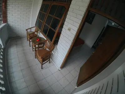 an overhead view of a room with chairs and a table at Palm Garden Kuta in Kuta