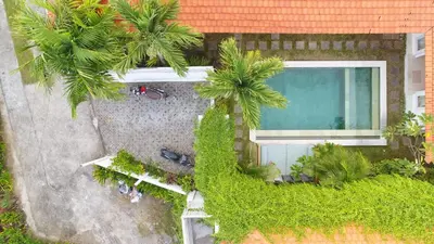 an overhead view of a house with a swimming pool at Villa Niluh in Canggu