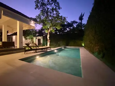 a swimming pool in the backyard of a house at Villa EMMA | heart of Seminyak | 350m Beach in Seminyak