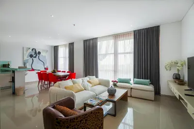 a living room with a couch and a table at Imani Suites in Seminyak
