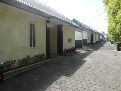 a row of buildings on a street at VILLA Nuri Merah 1 in Kerobokan