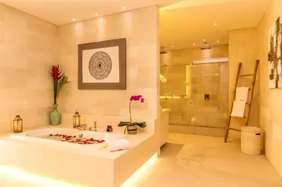 a large bathroom with a tub and a shower at Villa Seriska Jimbaran - Spacious 5BR Private Pool Villa with Private Cook, Spa & Tour in Jimbaran