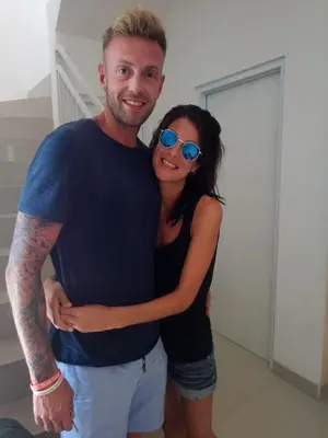 a man and a woman posing for a picture at Wika Bali Beach House in Jimbaran
