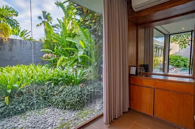 an indoor garden is seen from the hallway of a house at Ziva a Boutique Villa in Seminyak