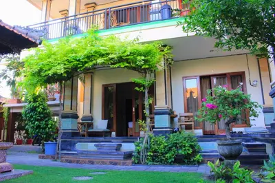 a house with a lot of plants on it at CR Tris Rooms Seminyak in Seminyak