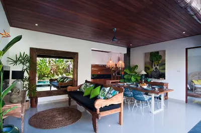 a living room with a couch and a table at 3BR Villa Erja - Minggu Villas - Special Stay Bonus in Kerobokan