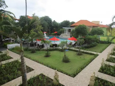 an aerial view of a resort with a swimming pool at Melasti Beach Resort & Spa Legian in Legian
