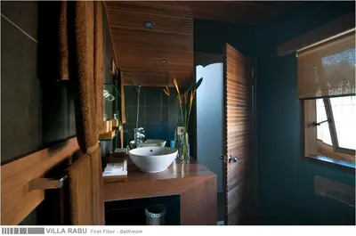 a bathroom with a sink and a mirror at 3BR Villa Rabu - Minggu Villas Seminyak in Seminyak