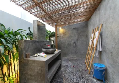 a bathroom with a sink and a shower at Villa Tinn Tamm by Optimum Bali Villas in Seminyak