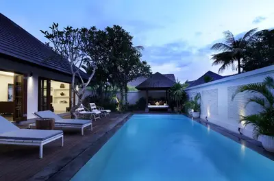 a swimming pool in the backyard of a villa at Nunia Boutique Villa in Seminyak