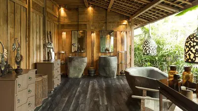 a bathroom with two sinks and a bath tub at Villa Zelie in Canggu