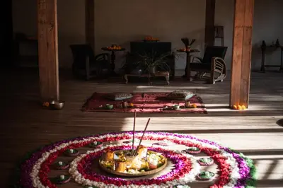 a table with a flower arrangement in a room at Balquisse Heritage Hotel in Jimbaran
