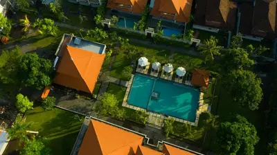 an overhead view of a house with a swimming pool at Kusuma Resort Seminyak in Seminyak