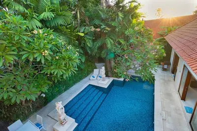 an aerial view of a garden with a pool at Super Value 3 Bed, Central Seminyak, Walk to Beach in Seminyak