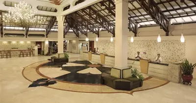 a rendering of a lobby with a reception area at Bintang Bali Resort in Kuta