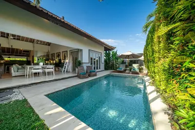 a swimming pool in the backyard of a villa at Villa Sarong 1 in Seminyak