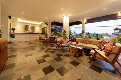 a living room with a checkered floor at Adepa Resort in Canggu