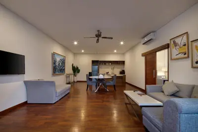 a living room with a couch and a table at The Daha Luxury Villas in Seminyak