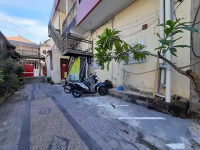 a scooter parked in front of a building at The Legian 777 in Legian