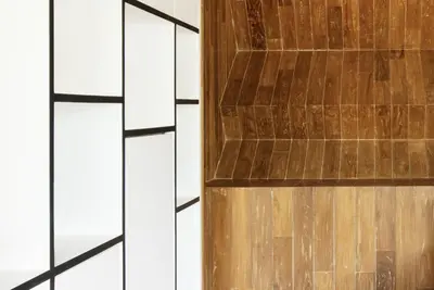 a close up of a wooden door in a room at Villa Keila Seminyak in Seminyak