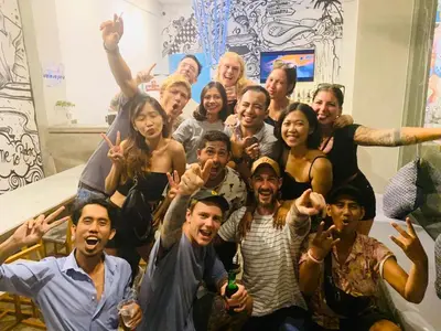 a group of people posing for a picture at Stellar Capsules in Seminyak