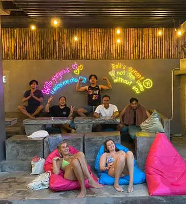 a group of people sitting in bean bags at Stellar Capsules in Seminyak