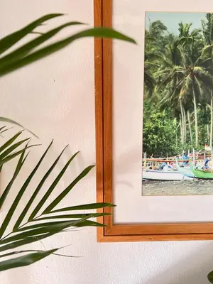 a picture of a picture of people in a boat at Villa Pagu in Seminyak