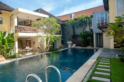 a swimming pool in the backyard of a villa at Abian Biu Mansion in Canggu