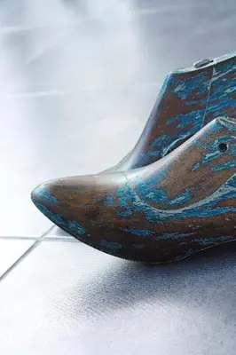 a close up of a brown and blue object on the floor at The Grey Boutique Inn in Legian