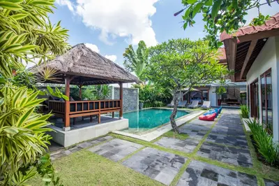 an image of a villa with a swimming pool at Amore Villas in Canggu