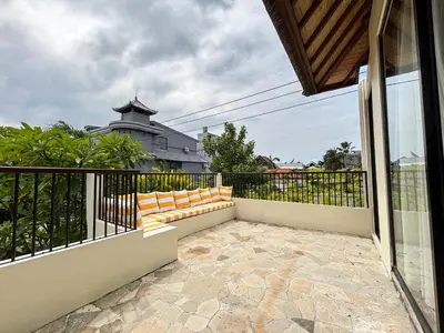 a balcony with a bench on a fence at NEW 2BR Minica Villa in the heart of Kayu Aya, Oberoi, Seminyak walking distance to Beach, Shops, Restaurants in Seminyak