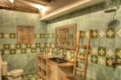 a bathroom with a sink and a toilet at Villa Layla - Charming 2BR Villa in Oberoi - Prime Location! in Seminyak