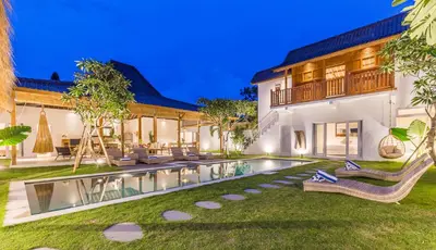 an exterior view of a house with a swimming pool at Villa soul in Seminyak