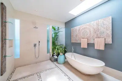 a bathroom with a large tub and a shower at Villa Sawah - 3bd in Seminyak Center in Seminyak